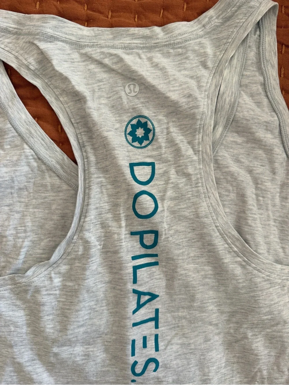lululemon athletica Light Heather Gray Racerback Tank with Teal Back Script
